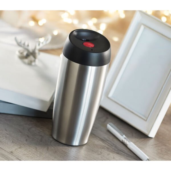BOURATI Travel Cup 350ml displayed beside a laptop
