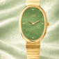 Time Level green dial watch oval gold case